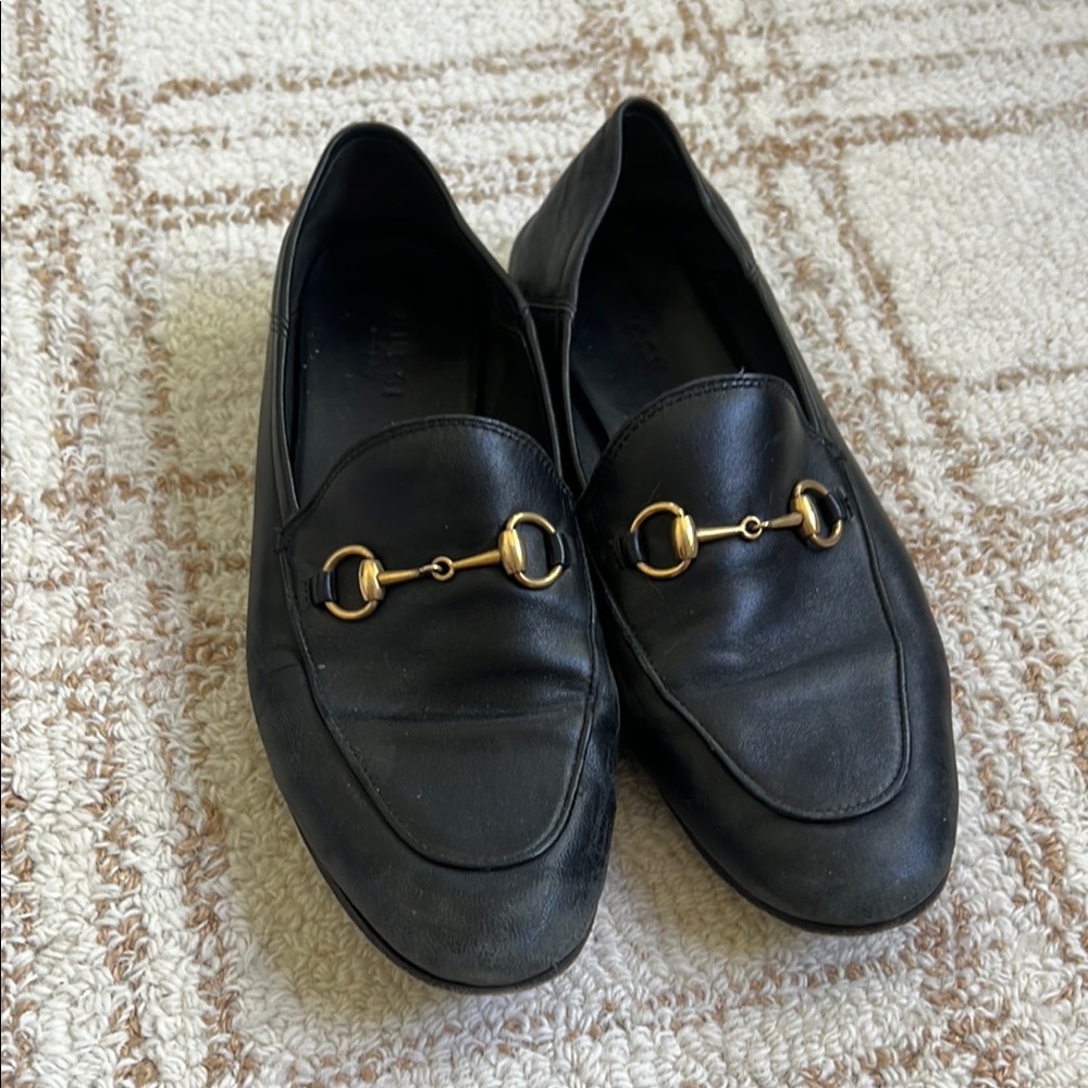 Gucci Black and Gold Loafers with Iconic Horsebit